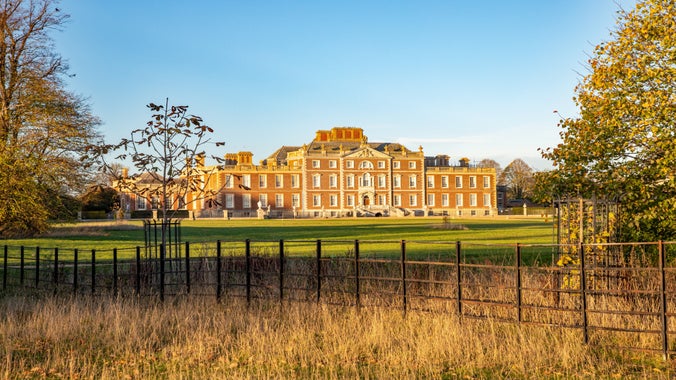 Wimpole Hall, a Georgian mansion in Cambridgeshire, is shown in autumn sunlight